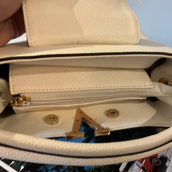 Valentina white purse. Used once + stored. Clean. See smudge of denim dye. Cute - Picture 4 of 6